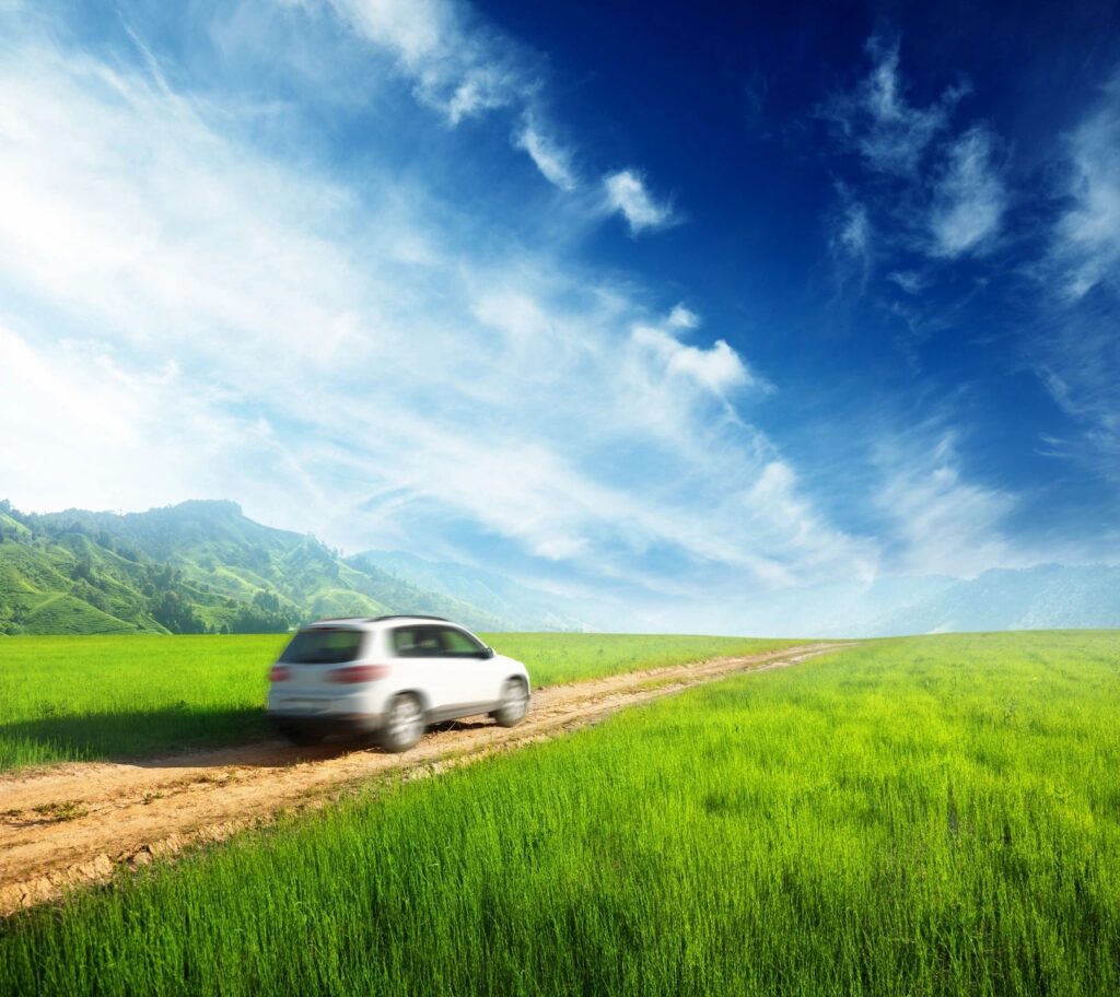 A Volkswagen driving smoothly on the road, showcasing its performance and reliability after expert maintenance at DriveTime Automotive in Salem, OR.